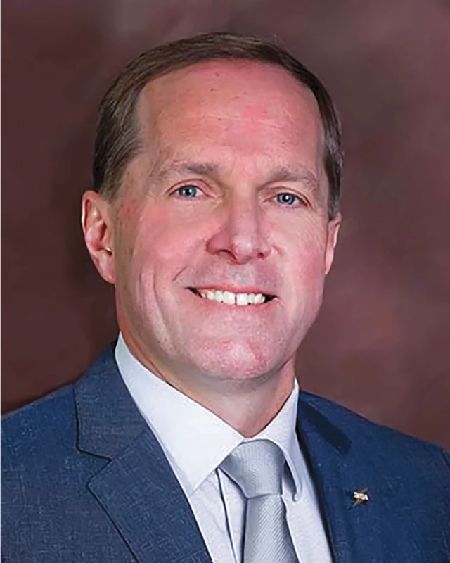 Headshot portrait of Daniel P. Cosner
